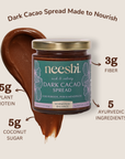 Neeshi dark cacao spread jar with nutritional information on a beige background